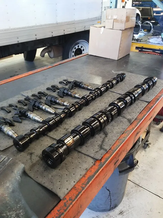 Truck engine parts on a workbench