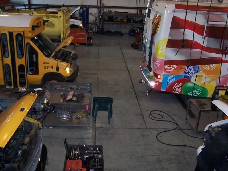 Overhead view of the busy truck repair shop floor